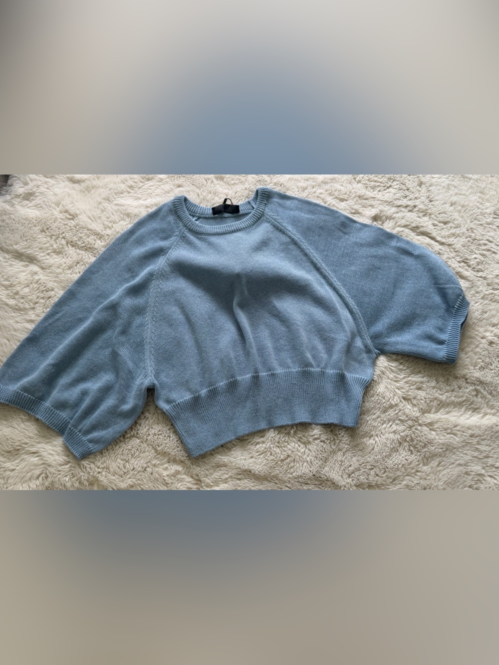 Cropped light blue crewneck  knit sweater.